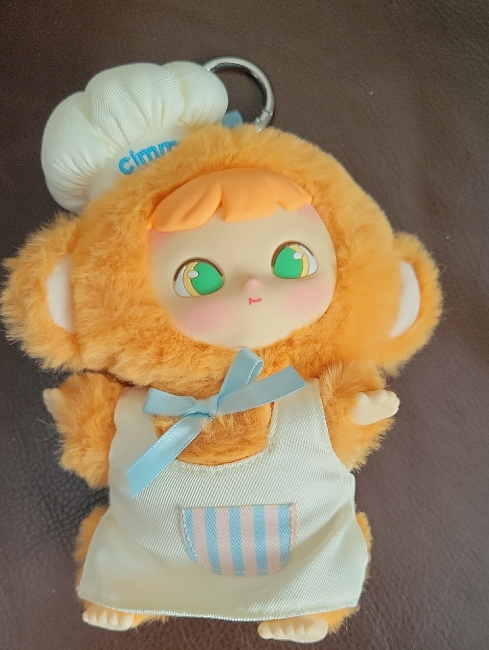 Cimmy Plush Orange Monkey Doll Keychain with Green Eyes and Cream Outfit
